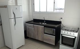 EXCELENTE APARTAMENTO NOVO - PRÓXIMO a PRAIA COM INTERNET !!